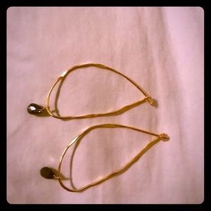 Gold earrings with grey bead